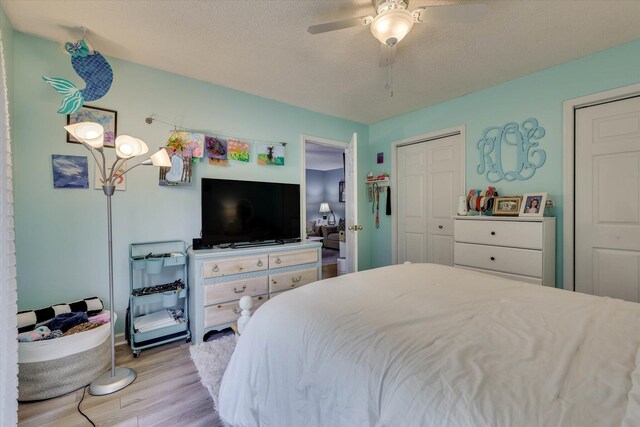 120 Stone St, Harlem, GA 30814 - bedroom featuring light wood finished floors, a textured ceiling, and ceiling fan