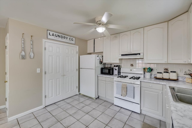 120 Stone St, Harlem, GA 30814 - kitchen featuring white appliances, under cabinet range hood, ceiling fan, light countertops, and white cabinets