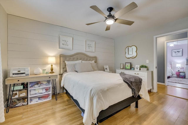 120 Stone St, Harlem, GA 30814 - bedroom featuring light wood finished floors, wood walls, and a ceiling fan