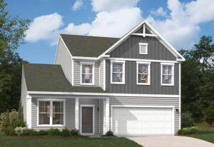 view of front of home with driveway, board and batten siding, an attached garage, and a front yard