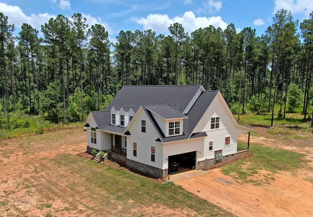 view of front of house with a garage and a front yard