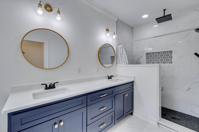 bathroom with vanity, ornamental molding, and tiled shower