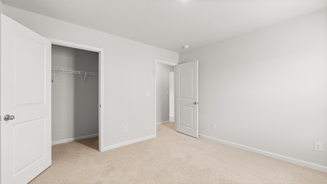 1257 Birch Cir, Grovetown, GA 30813 - unfurnished bedroom with light colored carpet, baseboards, and a closet