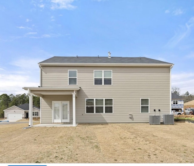 1257 Birch Cir, Grovetown, GA 30813 - back of property featuring central AC unit and a patio area