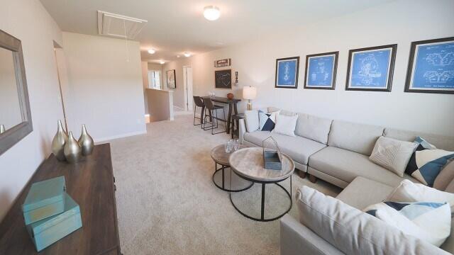 1257 Birch Cir, Grovetown, GA 30813 - living room with attic access, carpet flooring, and baseboards