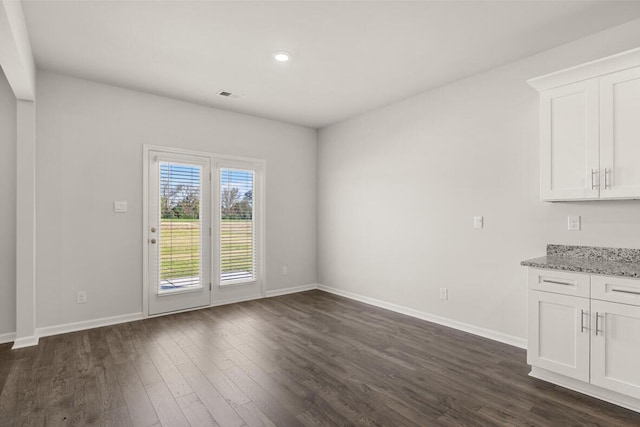 1257 Birch Cir, Grovetown, GA 30813 - unfurnished dining area featuring dark wood finished floors, baseboards, and recessed lighting