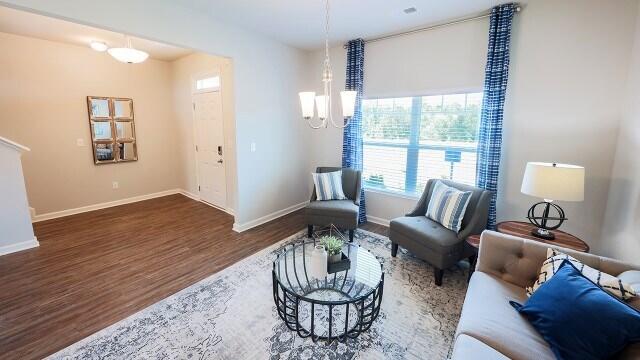 1257 Birch Cir, Grovetown, GA 30813 - living area with wood finished floors, a chandelier, and baseboards