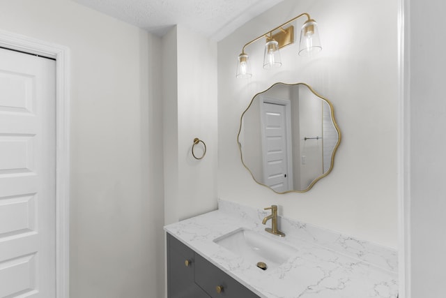 319 Indian Trl, Augusta, GA 30907 - bathroom with vanity and a textured ceiling