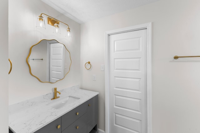 319 Indian Trl, Augusta, GA 30907 - bathroom featuring vanity and a textured ceiling