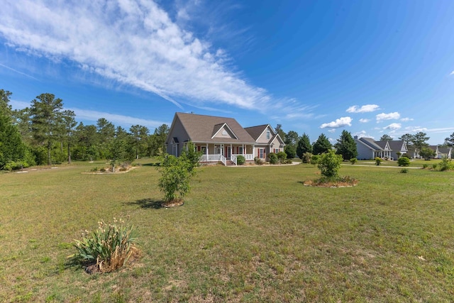 view of front of house with a front lawn and a porch
