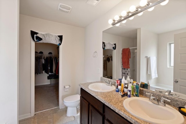 108 Sims Ct, Augusta, GA 30909 - bathroom with a stall shower, double vanity, a walk in closet, and a bathtub