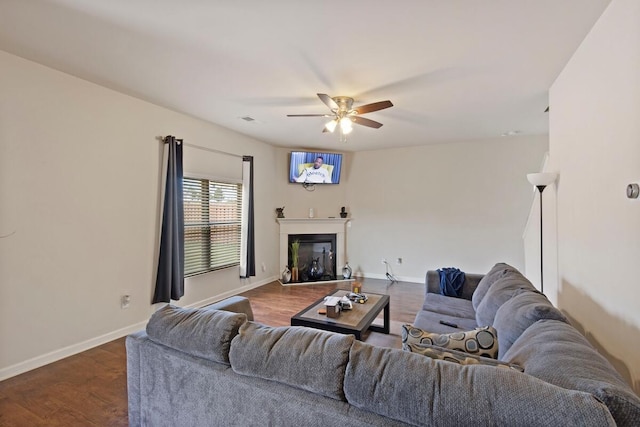 108 Sims Ct, Augusta, GA 30909 - living area with ceiling fan, dark wood-style floors, and a glass covered fireplace