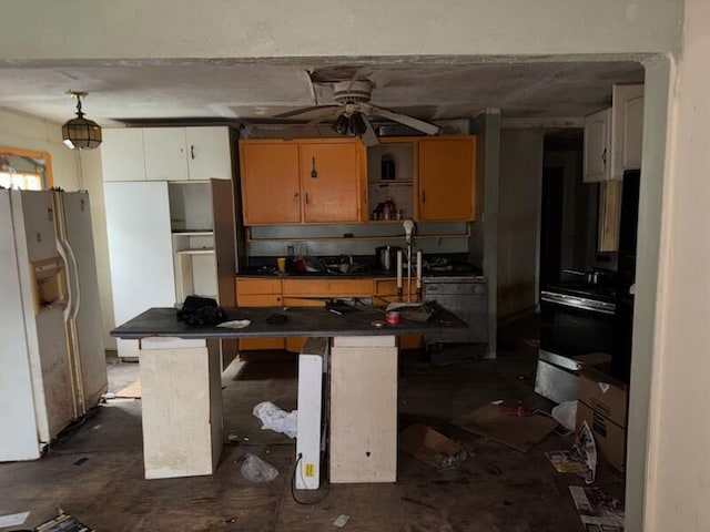 1548 Koger St, Augusta, GA 30904 - kitchen with white fridge with ice dispenser, dark countertops, open shelves, ceiling fan, and a center island