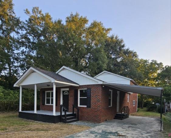 view of front of house featuring a carport