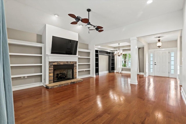 459 Sebastian Dr, Grovetown, GA 30813 - unfurnished living room with a chandelier, a fireplace, wood finished floors, vaulted ceiling, and built in features