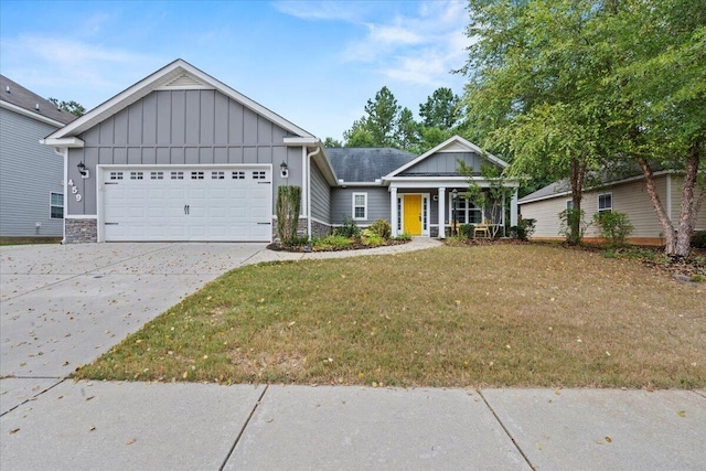 459 Sebastian Dr, Grovetown, GA 30813 - ranch-style house featuring board and batten siding, a front yard, an attached garage, concrete driveway, and a porch