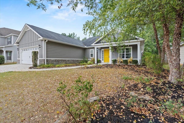 459 Sebastian Dr, Grovetown, GA 30813 - view of front of property featuring board and batten siding, stone siding, and an attached garage