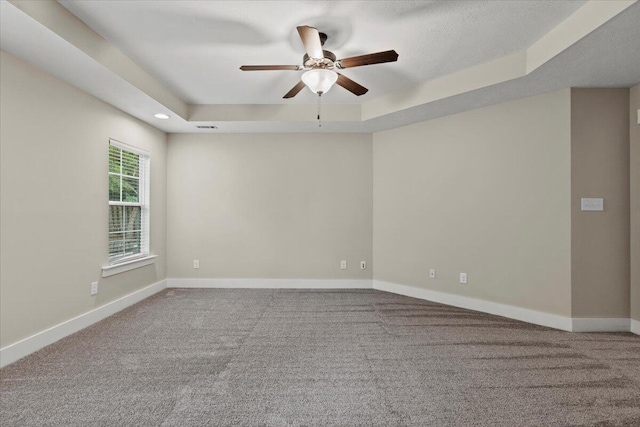 459 Sebastian Dr, Grovetown, GA 30813 - spare room featuring a tray ceiling, ceiling fan, carpet floors, and recessed lighting