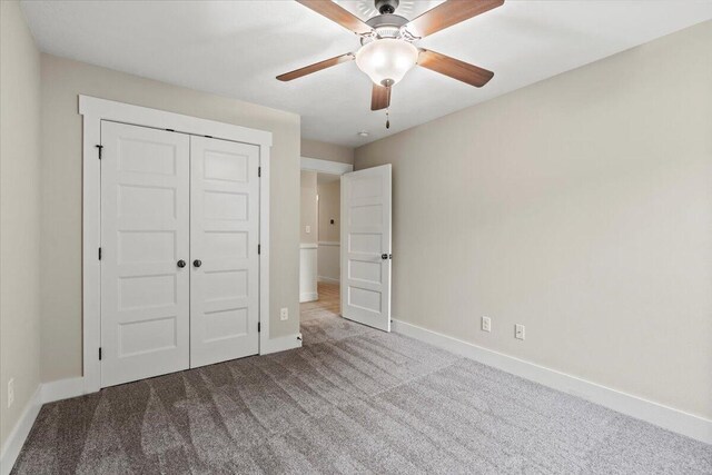 459 Sebastian Dr, Grovetown, GA 30813 - unfurnished bedroom with carpet, a closet, and ceiling fan
