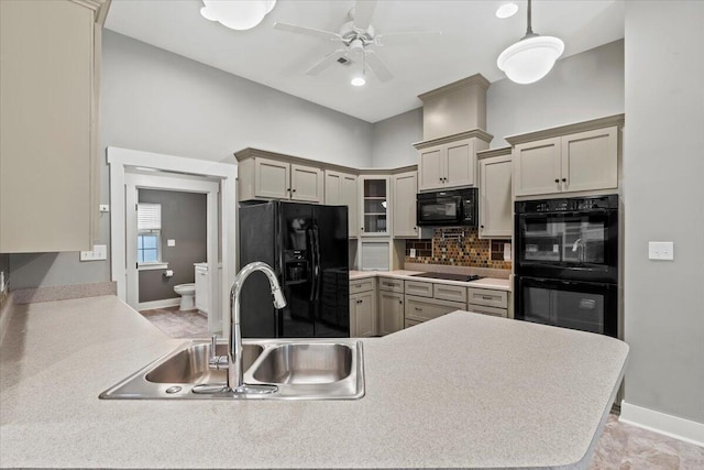 459 Sebastian Dr, Grovetown, GA 30813 - kitchen with black appliances, decorative backsplash, ceiling fan, glass insert cabinets, and light countertops