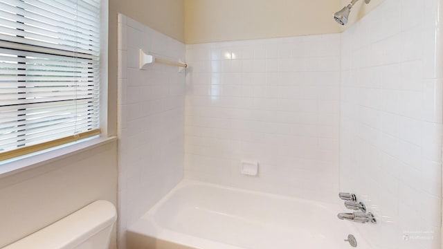 full bathroom with toilet and bathtub / shower combination