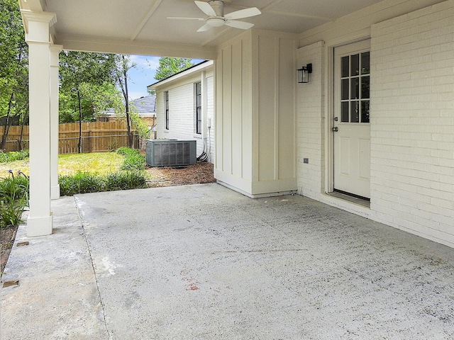 view of patio / terrace featuring ceiling fan, central AC, and fence