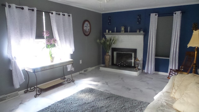 living room featuring crown molding and a brick fireplace