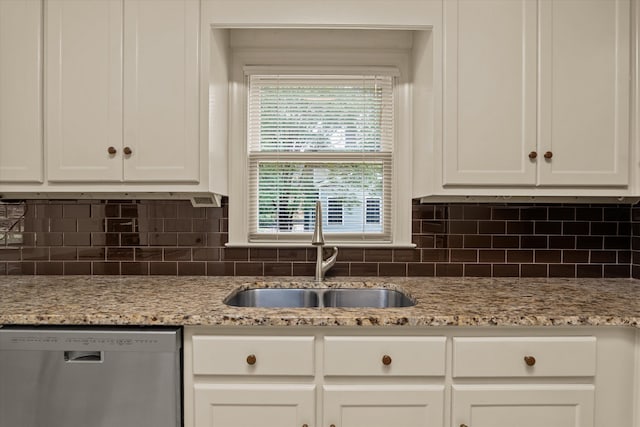 4119 N Knollcrest Cir, Martinez, GA 30907 - kitchen with stainless steel dishwasher, a sink, white cabinets, and decorative backsplash