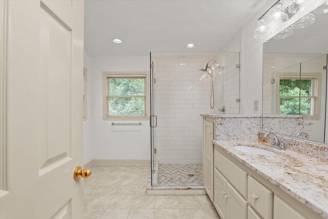 4119 N Knollcrest Cir, Martinez, GA 30907 - full bathroom featuring a stall shower, vanity, tile patterned flooring, recessed lighting, and baseboards