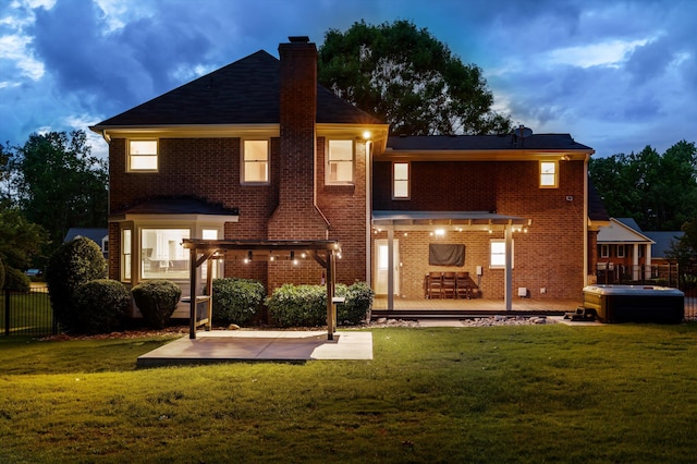 4119 N Knollcrest Cir, Martinez, GA 30907 - rear view of property with a hot tub, a chimney, brick siding, and a patio