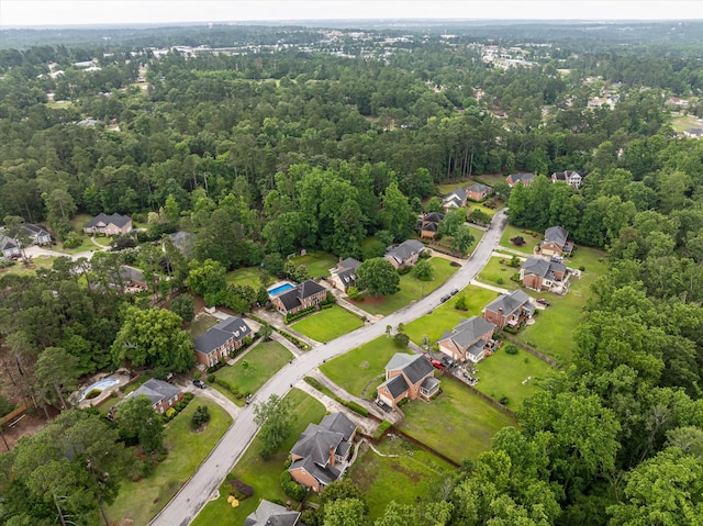 4119 N Knollcrest Cir, Martinez, GA 30907 - aerial overview of property's location with nearby suburban area and a forest