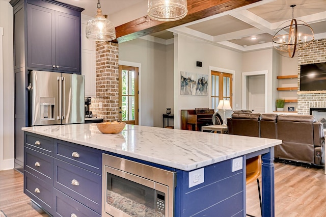 2550 Otts Ln, Harlem, GA 30814 - kitchen with appliances with stainless steel finishes, light wood-type flooring, a fireplace, open floor plan, and beamed ceiling