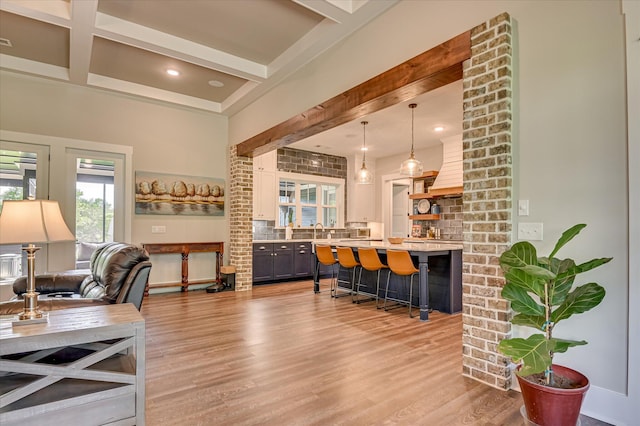 2550 Otts Ln, Harlem, GA 30814 - living room with beam ceiling, light wood finished floors, and recessed lighting