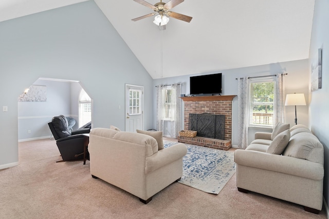 222 Canterbury Dr, Wrens, GA 30833 - carpeted living area featuring a ceiling fan, a fireplace, and high vaulted ceiling