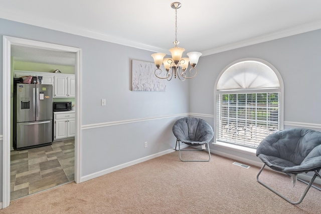 222 Canterbury Dr, Wrens, GA 30833 - sitting room featuring light carpet, ornamental molding, and a chandelier