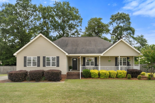 222 Canterbury Dr, Wrens, GA 30833 - view of front facade featuring covered porch and roof with shingles