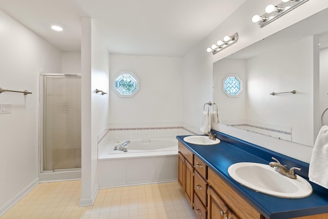 222 Canterbury Dr, Wrens, GA 30833 - full bathroom with a garden tub, double vanity, and a shower stall