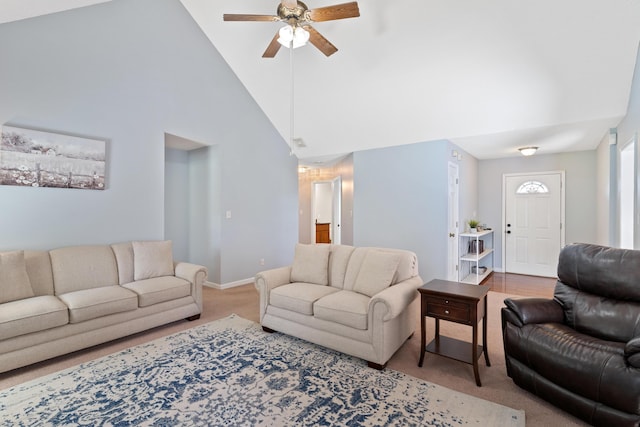 222 Canterbury Dr, Wrens, GA 30833 - carpeted living room with a ceiling fan and high vaulted ceiling