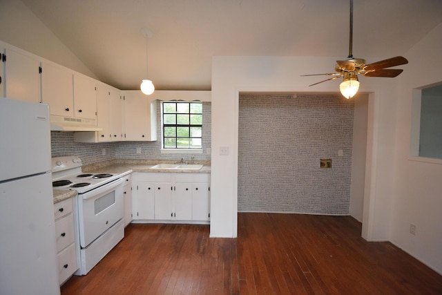 kitchen featuring white appliances, dark wood-type flooring, white cabinets, decorative backsplash, and brick wall