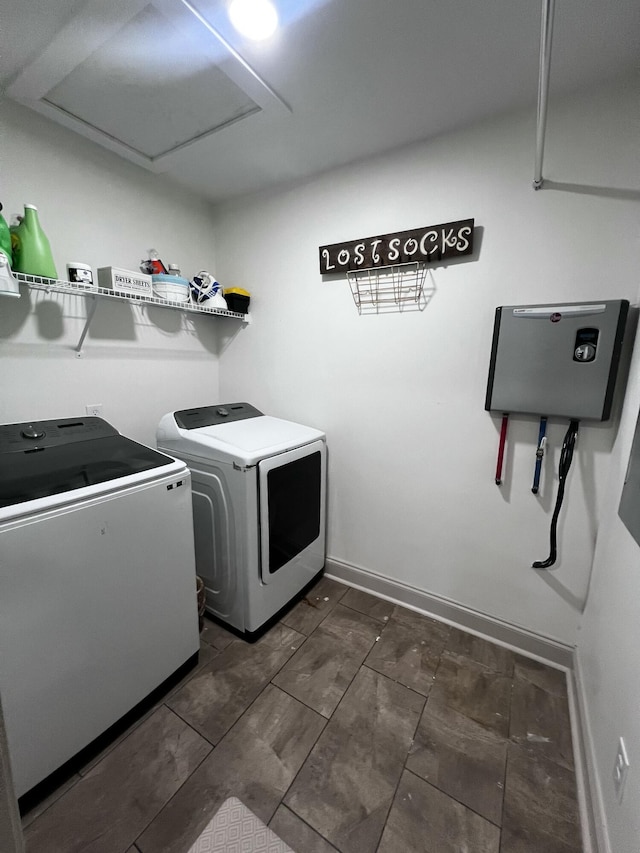 2786 Tudor Rd, Dearing, GA 30808 - laundry room with washer and clothes dryer