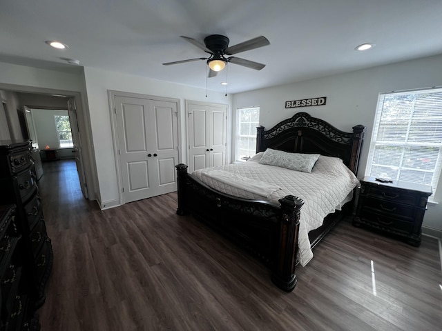 2786 Tudor Rd, Dearing, GA 30808 - bedroom featuring dark wood-style floors, two closets, recessed lighting, and a ceiling fan