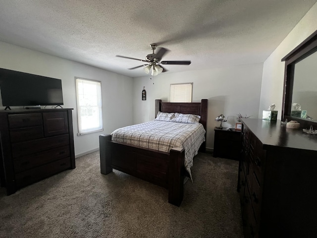 2786 Tudor Rd, Dearing, GA 30808 - carpeted bedroom with ceiling fan and a textured ceiling
