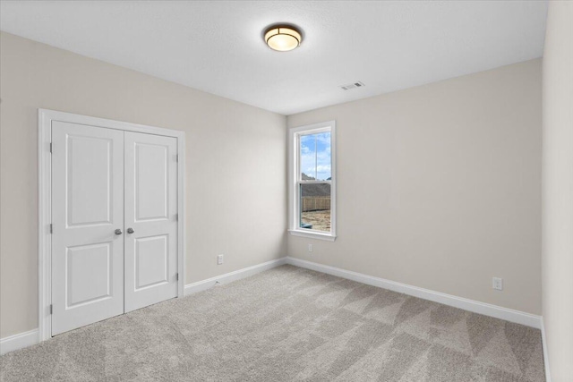 corridor with dark hardwood / wood-style flooring and crown molding