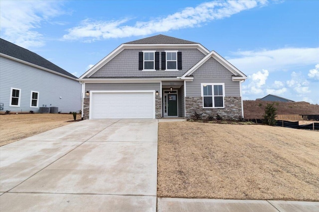 craftsman-style house with a front yard