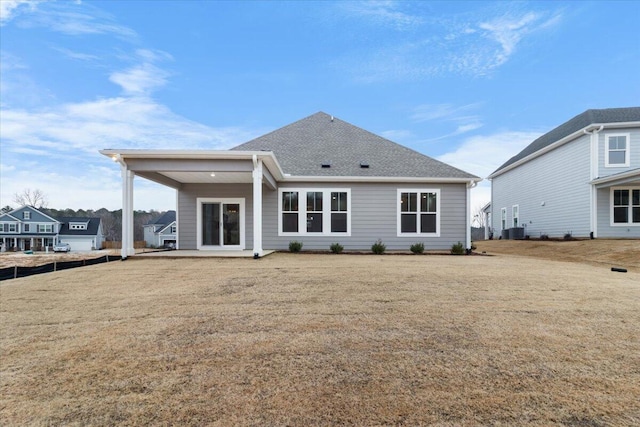 craftsman inspired home featuring a garage and a front yard