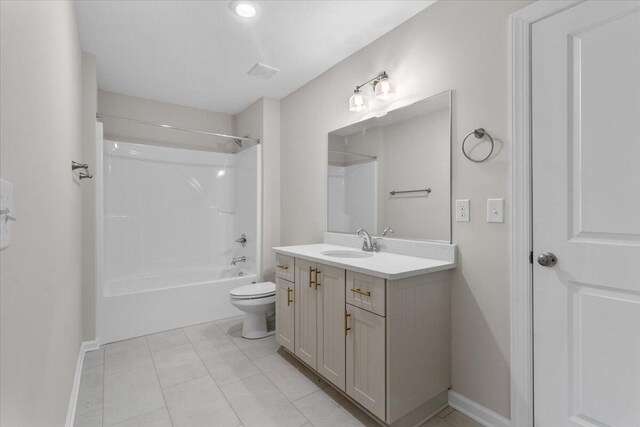 bathroom featuring tile patterned flooring and vanity