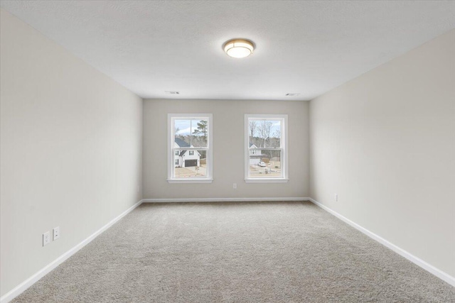 spacious closet with dark carpet