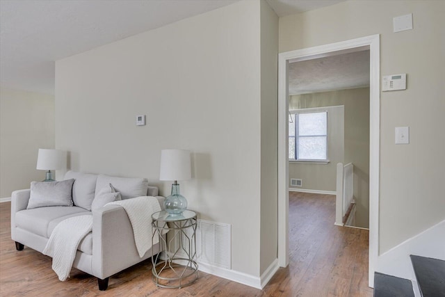 bedroom with hardwood / wood-style flooring