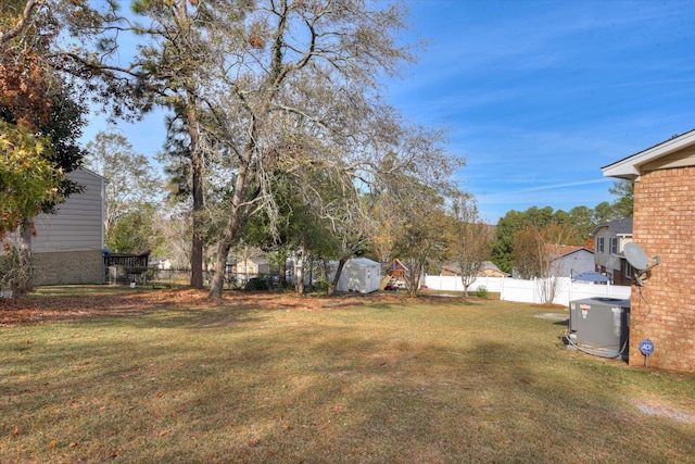 view of yard with central AC