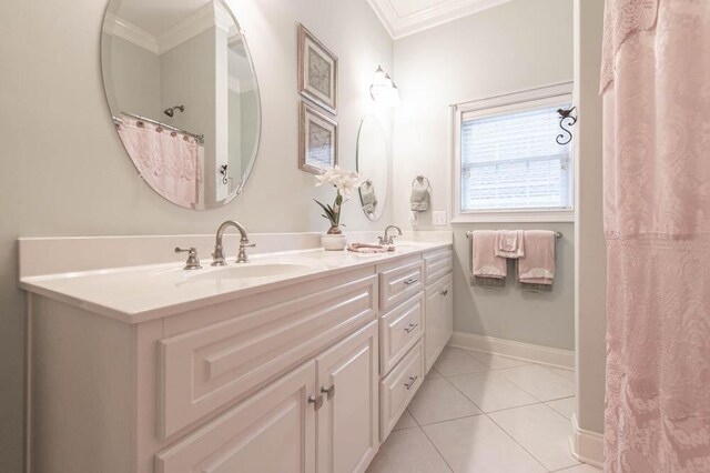 bathroom with tile patterned flooring, vanity, and ornamental molding